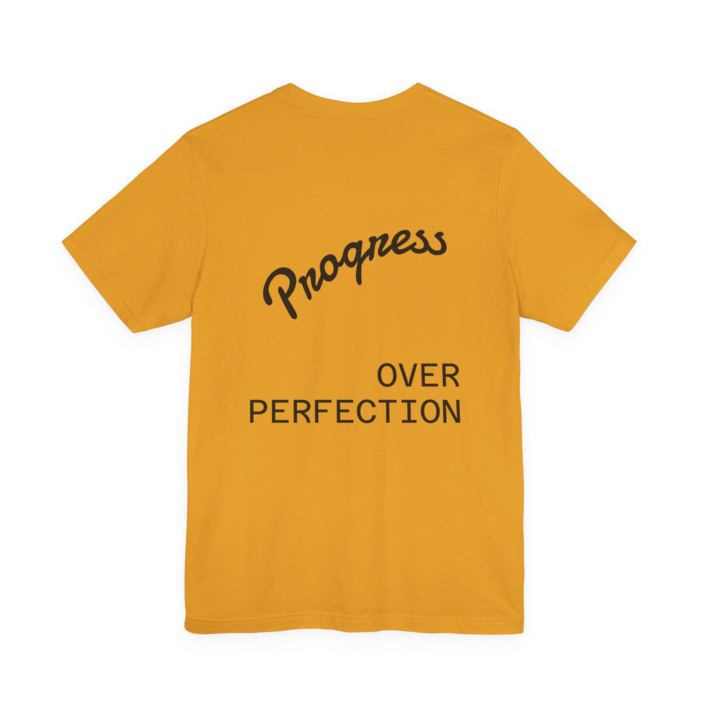 Pride Week Rainbow Heart Tee — "Progress Over Perfection" Back Print