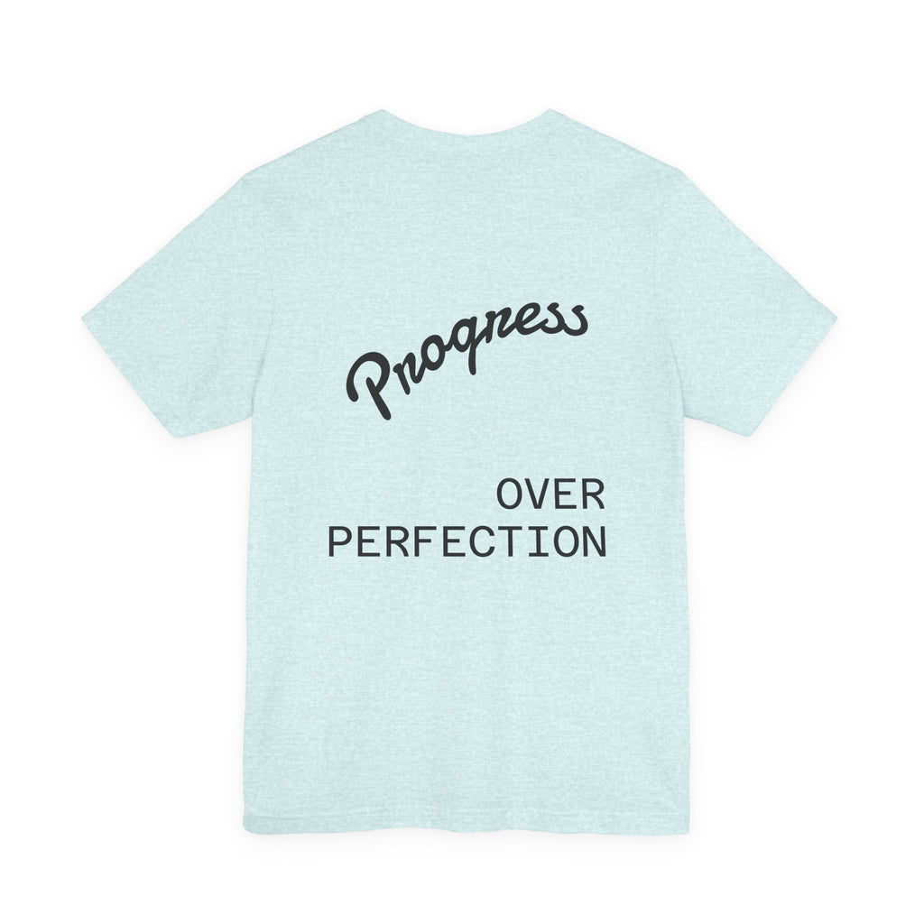 Pride Week Rainbow Heart Tee — "Progress Over Perfection" Back Print