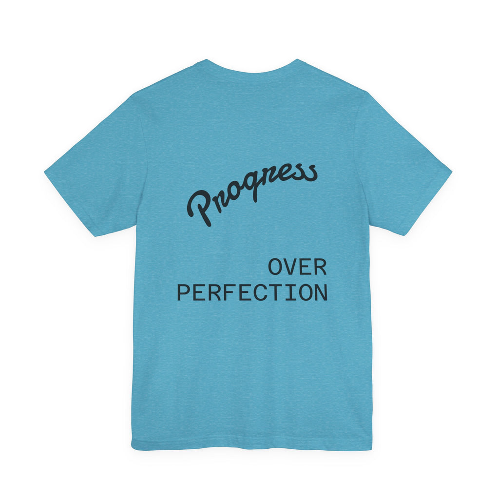 Pride Week Rainbow Heart Tee — "Progress Over Perfection" Back Print