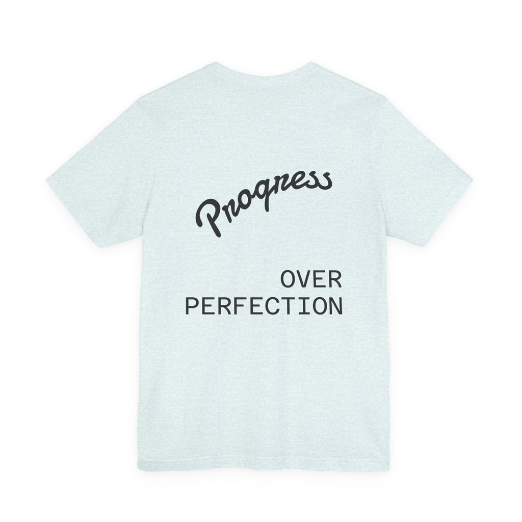 Pride Week Rainbow Heart Tee — "Progress Over Perfection" Back Print